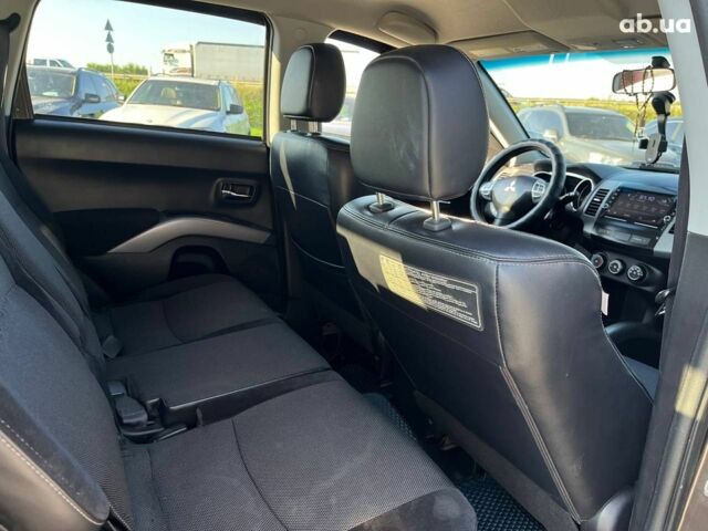 Мицубиси Аутлендер 2010 в Львове на Automoto.ua Коричневый Мицубиси Аутлендер, объемом двигателя 2.4 л и пробегом 303 тыс. км за 8990 $, фото 12 на Automoto.ua