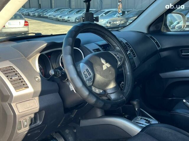 Мицубиси Аутлендер 2010 в Львове на Automoto.ua Коричневый Мицубиси Аутлендер, объемом двигателя 2.4 л и пробегом 303 тыс. км за 8990 $, фото 33 на Automoto.ua