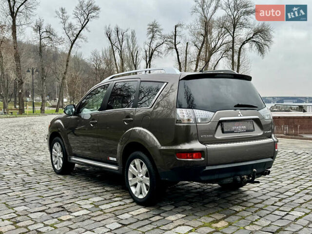 Коричневый Мицубиси Аутлендер, объемом двигателя 2.18 л и пробегом 208 тыс. км за 10555 $, фото 8 на Automoto.ua