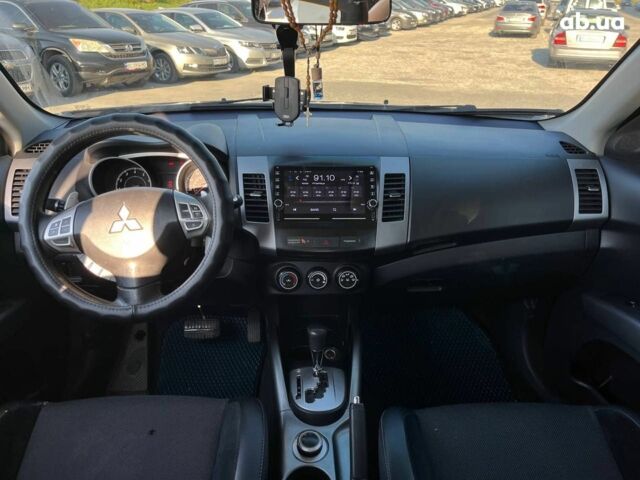 Мицубиси Аутлендер 2010 в Львове на Automoto.ua Коричневый Мицубиси Аутлендер, объемом двигателя 2.4 л и пробегом 303 тыс. км за 8990 $, фото 17 на Automoto.ua