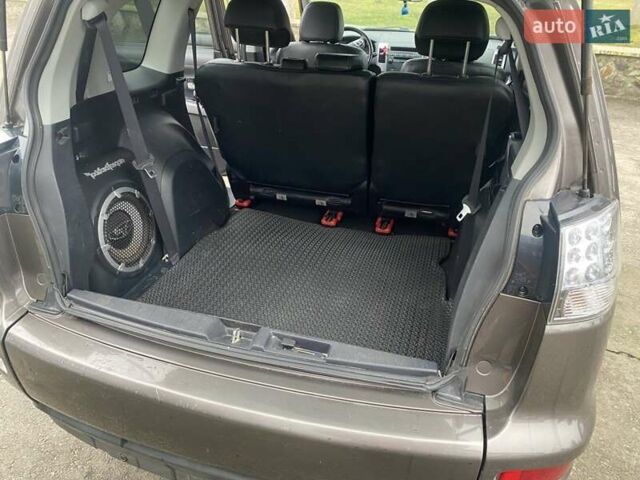 Коричневий Міцубісі Аутлендер, об'ємом двигуна 2.2 л та пробігом 266 тис. км за 11000 $, фото 12 на Automoto.ua