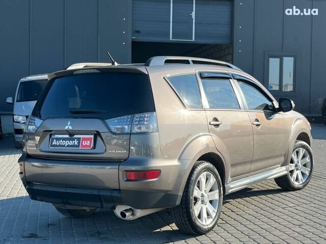 Мицубиси Аутлендер 2010 в Львове на Automoto.ua Коричневый Мицубиси Аутлендер, объемом двигателя 2.4 л и пробегом 303 тыс. км за 8990 $, фото 40 на Automoto.ua