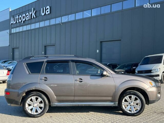 Мицубиси Аутлендер 2010 в Львове на Automoto.ua Коричневый Мицубиси Аутлендер, объемом двигателя 2.4 л и пробегом 303 тыс. км за 8990 $, фото 42 на Automoto.ua