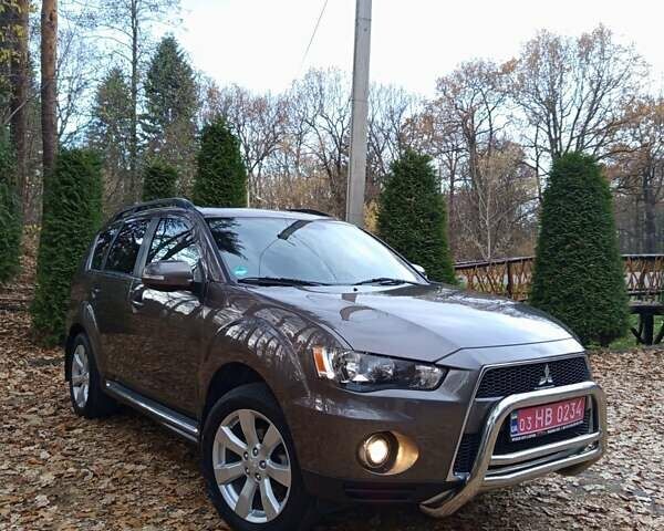 Коричневый Мицубиси Аутлендер, объемом двигателя 2.2 л и пробегом 155 тыс. км за 11350 $, фото 2 на Automoto.ua