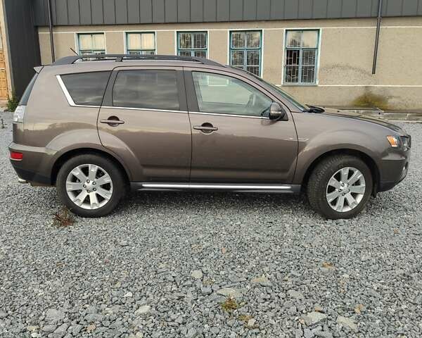 Коричневий Міцубісі Аутлендер, об'ємом двигуна 2.27 л та пробігом 149 тис. км за 12800 $, фото 5 на Automoto.ua