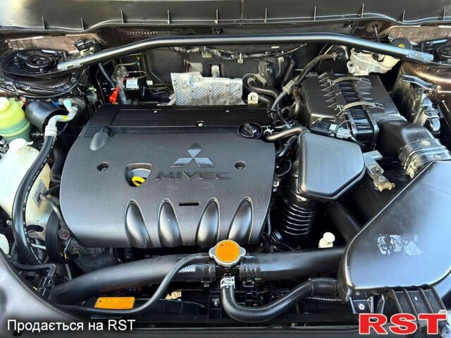 Коричневый Мицубиси Аутлендер, объемом двигателя 2.4 л и пробегом 178 тыс. км за 10550 $, фото 7 на Automoto.ua