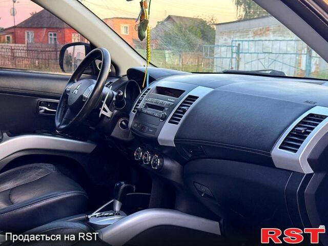 Коричневый Мицубиси Аутлендер, объемом двигателя 2.4 л и пробегом 178 тыс. км за 10550 $, фото 8 на Automoto.ua