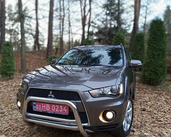 Коричневый Мицубиси Аутлендер, объемом двигателя 2.2 л и пробегом 155 тыс. км за 11350 $, фото 28 на Automoto.ua