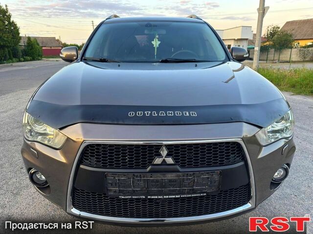 Коричневый Мицубиси Аутлендер, объемом двигателя 2.4 л и пробегом 178 тыс. км за 10550 $, фото 1 на Automoto.ua