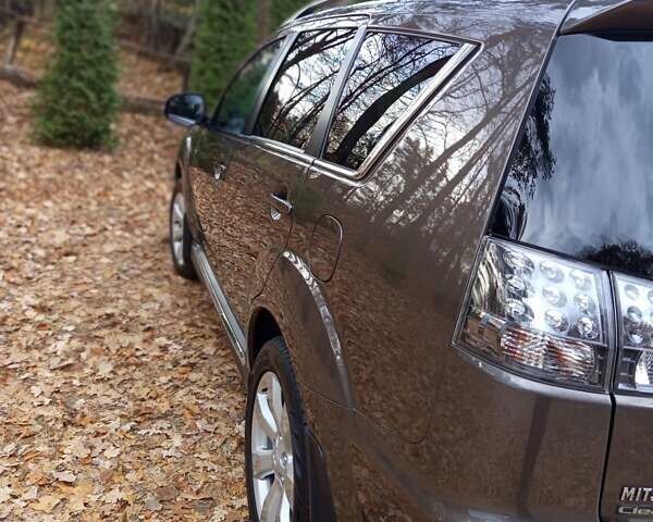 Коричневый Мицубиси Аутлендер, объемом двигателя 2.2 л и пробегом 155 тыс. км за 11350 $, фото 45 на Automoto.ua