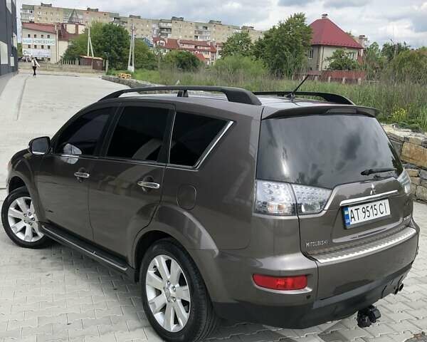 Коричневий Міцубісі Аутлендер, об'ємом двигуна 2.3 л та пробігом 250 тис. км за 11800 $, фото 5 на Automoto.ua