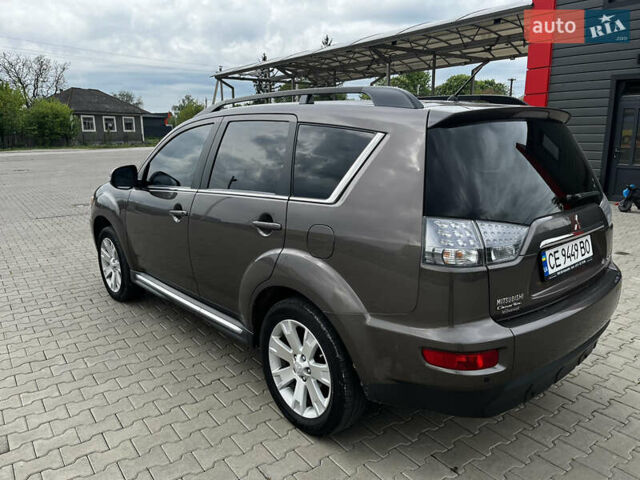 Коричневый Мицубиси Аутлендер, объемом двигателя 2.27 л и пробегом 290 тыс. км за 11950 $, фото 2 на Automoto.ua