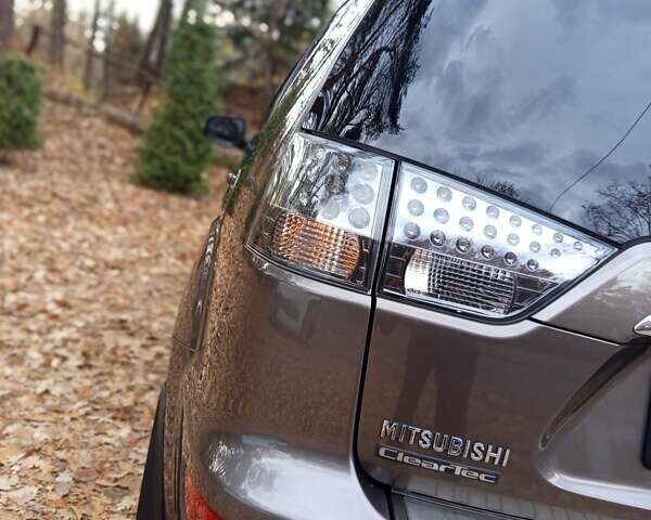 Коричневый Мицубиси Аутлендер, объемом двигателя 2.2 л и пробегом 155 тыс. км за 11350 $, фото 34 на Automoto.ua