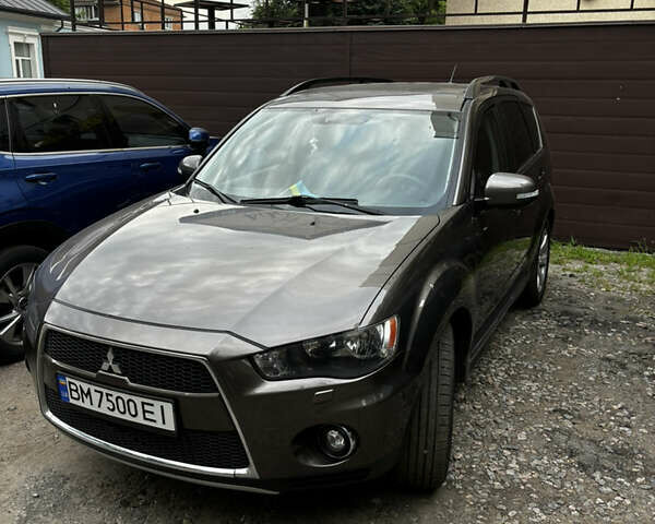 Коричневый Мицубиси Аутлендер, объемом двигателя 2.18 л и пробегом 259 тыс. км за 10900 $, фото 2 на Automoto.ua