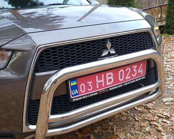 Коричневый Мицубиси Аутлендер, объемом двигателя 2.2 л и пробегом 155 тыс. км за 11350 $, фото 17 на Automoto.ua