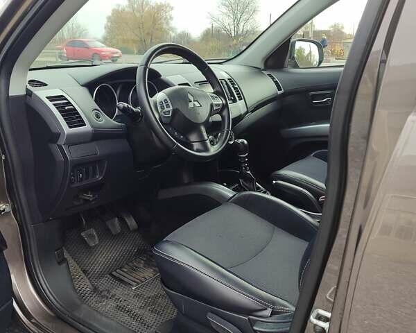 Коричневий Міцубісі Аутлендер, об'ємом двигуна 2.27 л та пробігом 149 тис. км за 12800 $, фото 10 на Automoto.ua