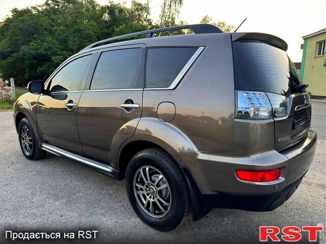Коричневый Мицубиси Аутлендер, объемом двигателя 2.4 л и пробегом 178 тыс. км за 10550 $, фото 3 на Automoto.ua