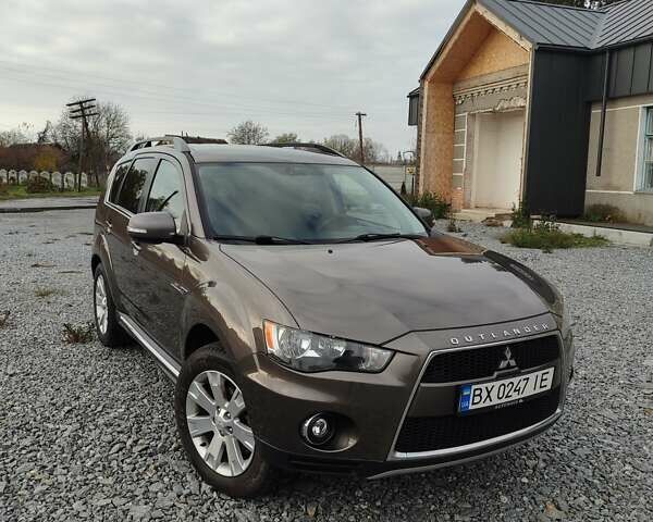 Коричневий Міцубісі Аутлендер, об'ємом двигуна 2.27 л та пробігом 149 тис. км за 12800 $, фото 1 на Automoto.ua