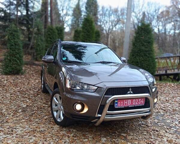 Коричневый Мицубиси Аутлендер, объемом двигателя 2.2 л и пробегом 155 тыс. км за 11350 $, фото 15 на Automoto.ua