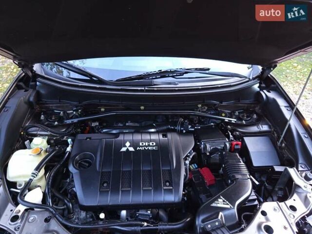 Коричневый Мицубиси Аутлендер, объемом двигателя 2.2 л и пробегом 155 тыс. км за 11350 $, фото 96 на Automoto.ua