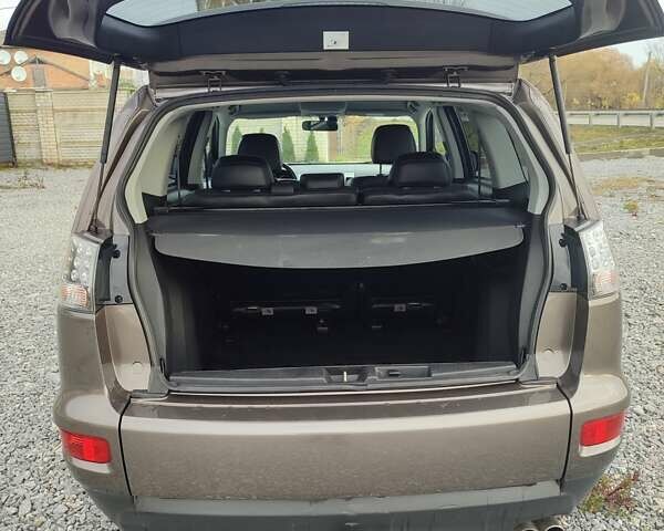 Коричневий Міцубісі Аутлендер, об'ємом двигуна 2.27 л та пробігом 149 тис. км за 12800 $, фото 7 на Automoto.ua