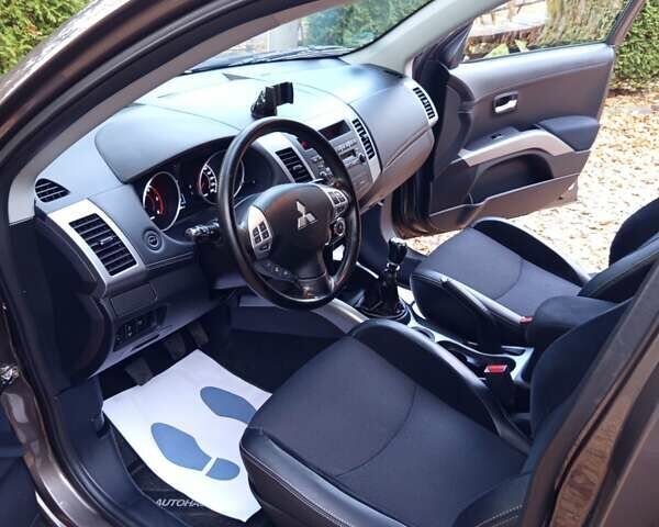 Коричневый Мицубиси Аутлендер, объемом двигателя 2.2 л и пробегом 155 тыс. км за 11350 $, фото 47 на Automoto.ua