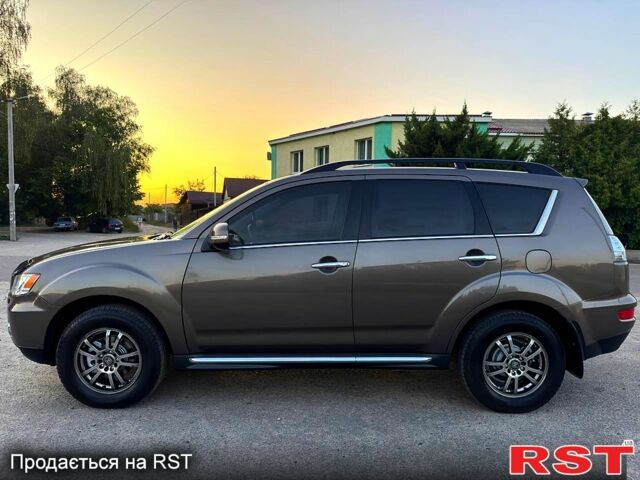Коричневый Мицубиси Аутлендер, объемом двигателя 2.4 л и пробегом 178 тыс. км за 10550 $, фото 2 на Automoto.ua