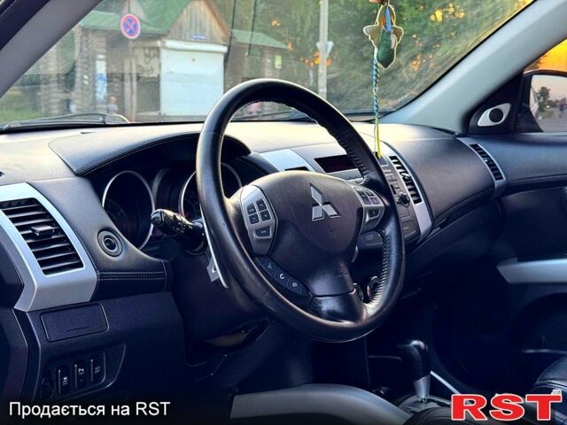 Коричневый Мицубиси Аутлендер, объемом двигателя 2.4 л и пробегом 178 тыс. км за 10550 $, фото 4 на Automoto.ua