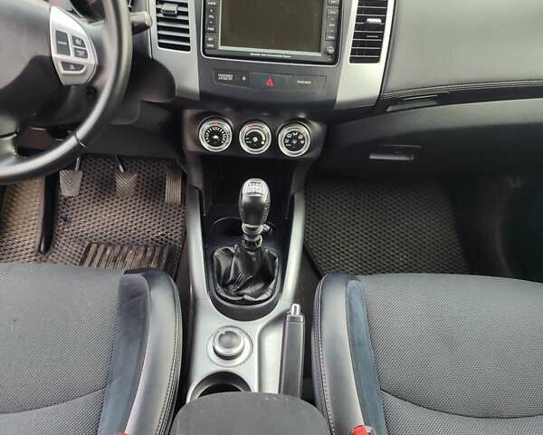 Коричневий Міцубісі Аутлендер, об'ємом двигуна 2.27 л та пробігом 149 тис. км за 12800 $, фото 11 на Automoto.ua