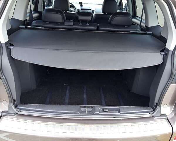 Коричневый Мицубиси Аутлендер, объемом двигателя 2.2 л и пробегом 155 тыс. км за 11350 $, фото 87 на Automoto.ua