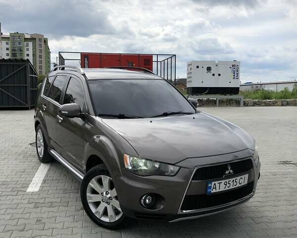 Коричневий Міцубісі Аутлендер, об'ємом двигуна 2.3 л та пробігом 250 тис. км за 11800 $, фото 1 на Automoto.ua