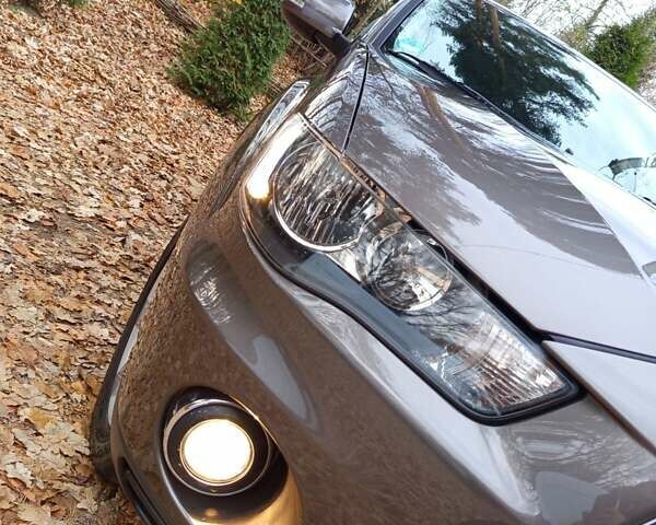 Коричневый Мицубиси Аутлендер, объемом двигателя 2.2 л и пробегом 155 тыс. км за 11350 $, фото 11 на Automoto.ua