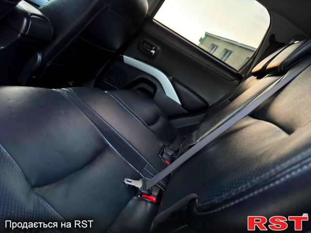 Коричневый Мицубиси Аутлендер, объемом двигателя 2.4 л и пробегом 178 тыс. км за 10550 $, фото 5 на Automoto.ua