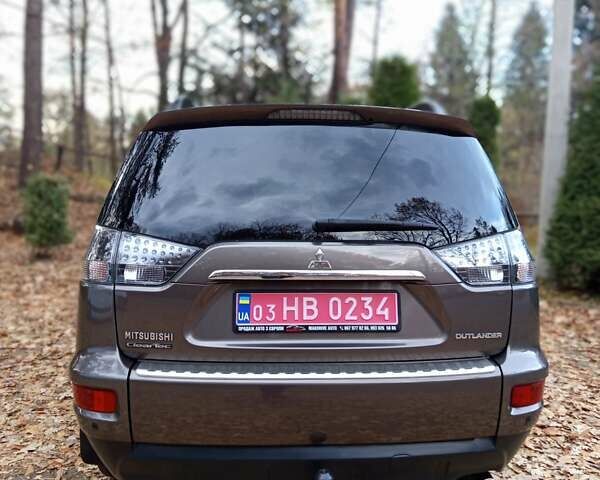 Коричневый Мицубиси Аутлендер, объемом двигателя 2.2 л и пробегом 155 тыс. км за 11350 $, фото 32 на Automoto.ua