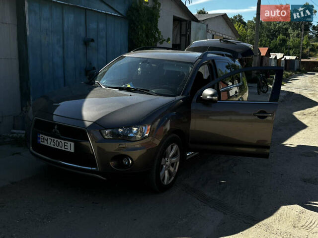 Коричневый Мицубиси Аутлендер, объемом двигателя 2.18 л и пробегом 259 тыс. км за 10900 $, фото 4 на Automoto.ua