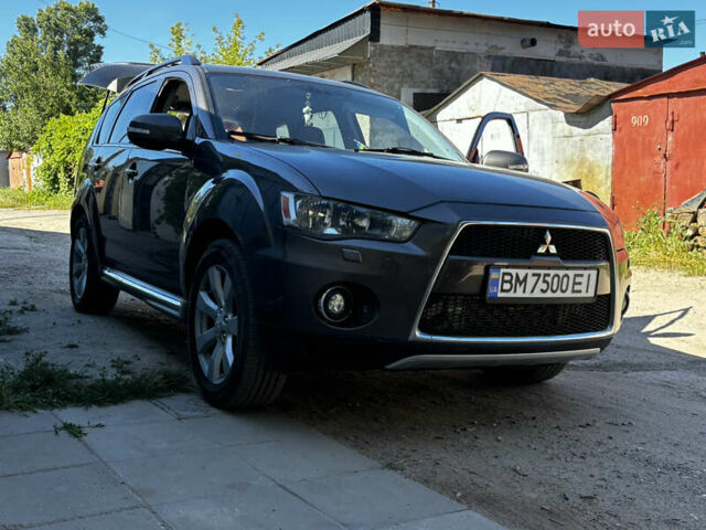 Коричневый Мицубиси Аутлендер, объемом двигателя 2.18 л и пробегом 259 тыс. км за 10900 $, фото 5 на Automoto.ua
