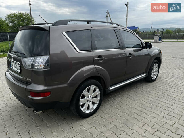 Коричневый Мицубиси Аутлендер, объемом двигателя 2.27 л и пробегом 290 тыс. км за 11950 $, фото 5 на Automoto.ua