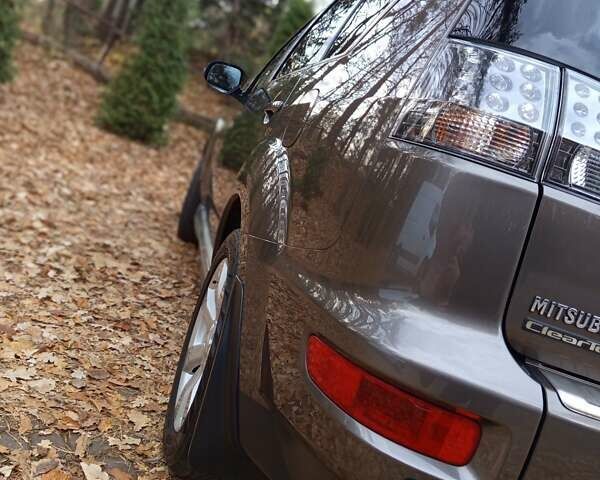 Коричневый Мицубиси Аутлендер, объемом двигателя 2.2 л и пробегом 155 тыс. км за 11350 $, фото 46 на Automoto.ua