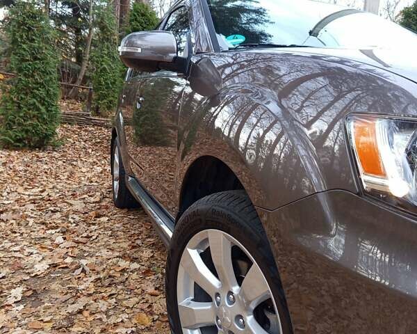 Коричневый Мицубиси Аутлендер, объемом двигателя 2.2 л и пробегом 155 тыс. км за 11350 $, фото 5 на Automoto.ua