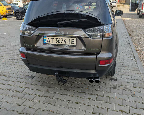 Коричневый Мицубиси Аутлендер, объемом двигателя 2.27 л и пробегом 242 тыс. км за 10900 $, фото 7 на Automoto.ua