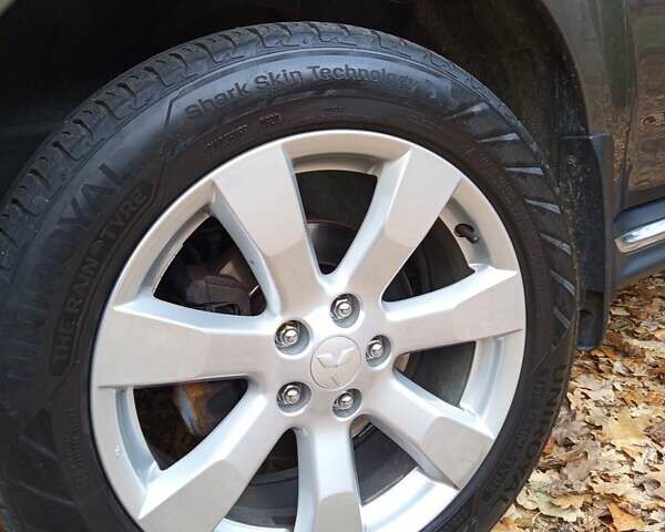 Коричневый Мицубиси Аутлендер, объемом двигателя 2.2 л и пробегом 155 тыс. км за 11350 $, фото 98 на Automoto.ua