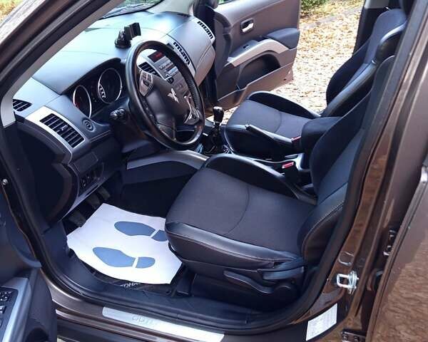 Коричневый Мицубиси Аутлендер, объемом двигателя 2.2 л и пробегом 155 тыс. км за 11350 $, фото 57 на Automoto.ua