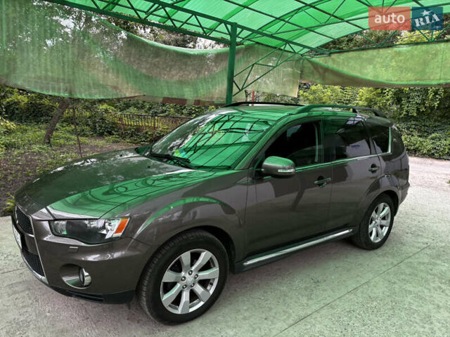 Коричневый Мицубиси Аутлендер, объемом двигателя 2.18 л и пробегом 259 тыс. км за 10900 $, фото 3 на Automoto.ua