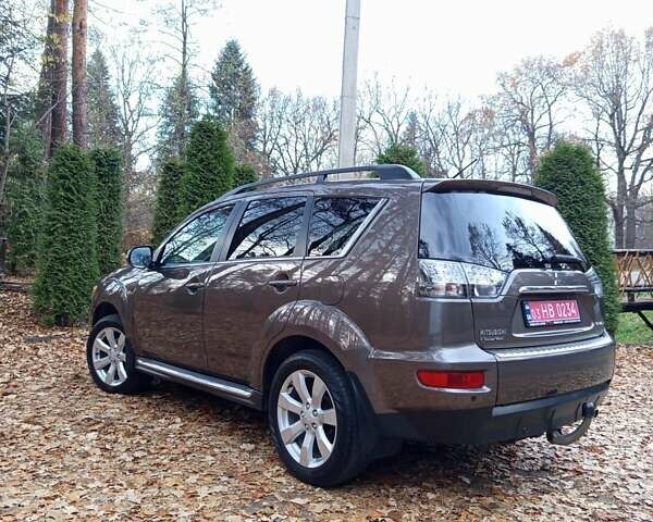 Коричневый Мицубиси Аутлендер, объемом двигателя 2.2 л и пробегом 155 тыс. км за 11350 $, фото 24 на Automoto.ua