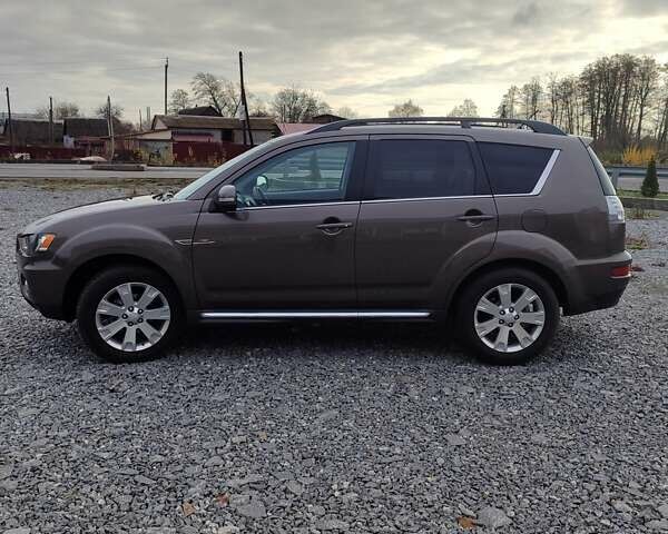 Коричневий Міцубісі Аутлендер, об'ємом двигуна 2.27 л та пробігом 149 тис. км за 12800 $, фото 4 на Automoto.ua