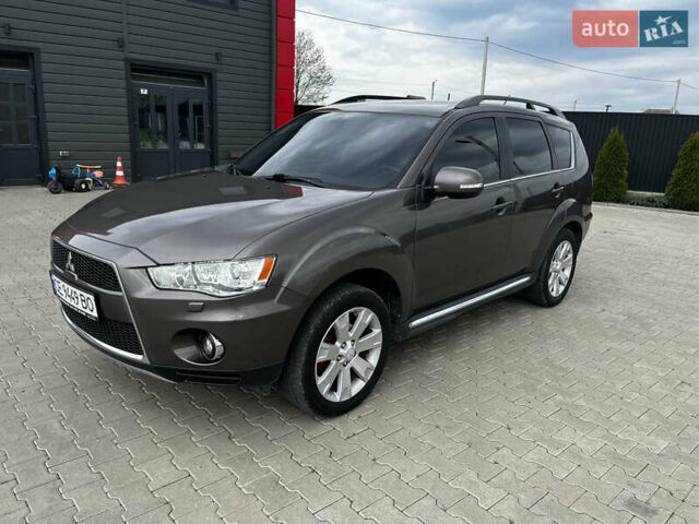Коричневый Мицубиси Аутлендер, объемом двигателя 2.27 л и пробегом 290 тыс. км за 11950 $, фото 6 на Automoto.ua