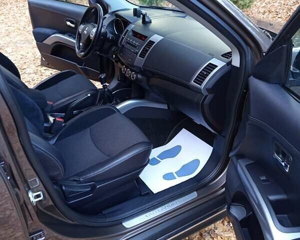 Коричневый Мицубиси Аутлендер, объемом двигателя 2.2 л и пробегом 155 тыс. км за 11350 $, фото 73 на Automoto.ua