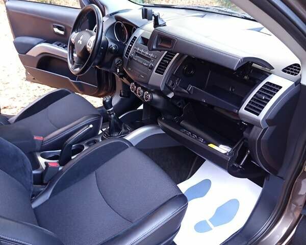 Коричневый Мицубиси Аутлендер, объемом двигателя 2.2 л и пробегом 155 тыс. км за 11350 $, фото 74 на Automoto.ua