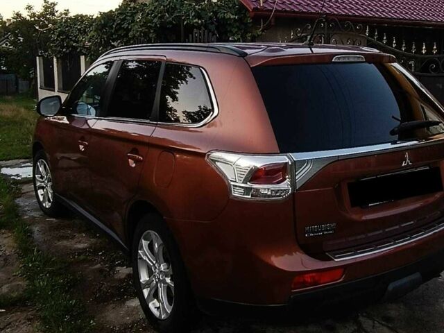 Коричневый Мицубиси Аутлендер, объемом двигателя 2.2 л и пробегом 210 тыс. км за 12500 $, фото 3 на Automoto.ua