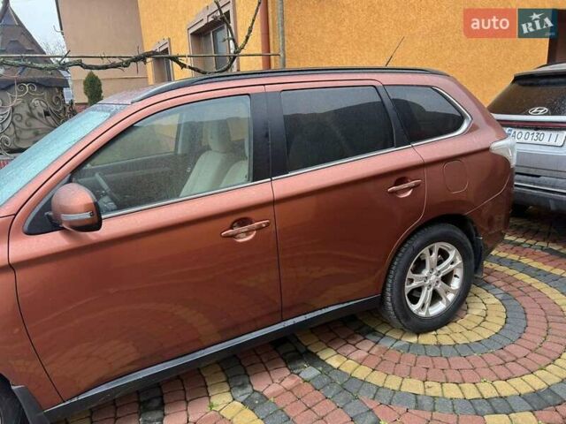 Коричневый Мицубиси Аутлендер, объемом двигателя 2.3 л и пробегом 317 тыс. км за 13000 $, фото 3 на Automoto.ua